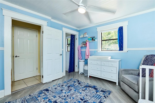 9802 N Oregon Ave, Tampa, FL 33612 - sitting room with ceiling fan, wood finished floors, and ornamental molding