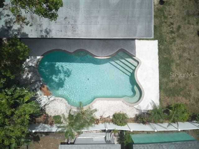 9802 N Oregon Ave, Tampa, FL 33612 - drone / aerial view of a pool area