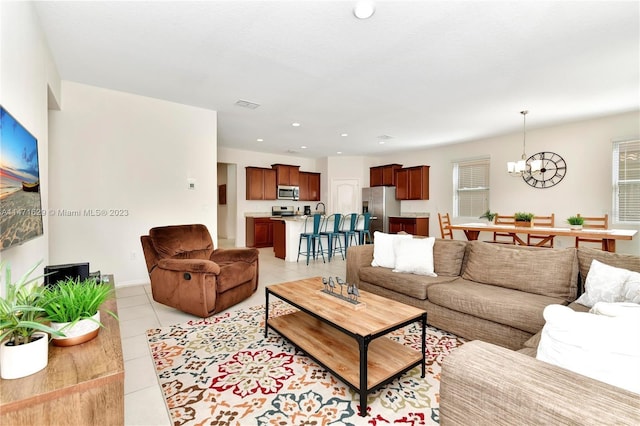 5247 Wildwood Way, Davenport, FL 33837 - living area with a chandelier, light tile patterned floors, recessed lighting, and baseboards