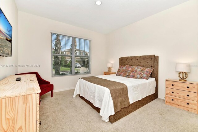 5247 Wildwood Way, Davenport, FL 33837 - carpeted bedroom with baseboards