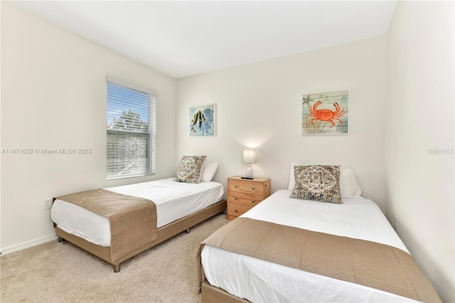 5247 Wildwood Way, Davenport, FL 33837 - bedroom featuring light colored carpet and baseboards
