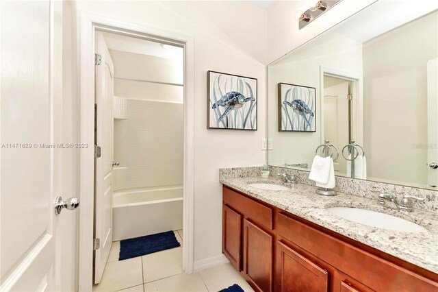 5247 Wildwood Way, Davenport, FL 33837 - bathroom featuring tile patterned floors and double vanity