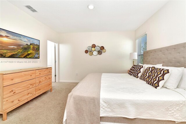 5247 Wildwood Way, Davenport, FL 33837 - bedroom with light carpet