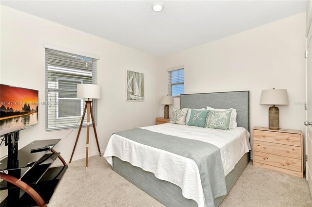 5247 Wildwood Way, Davenport, FL 33837 - bedroom featuring carpet and baseboards