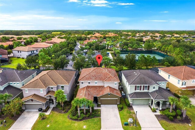 5247 Wildwood Way, Davenport, FL 33837 - aerial perspective of suburban area
