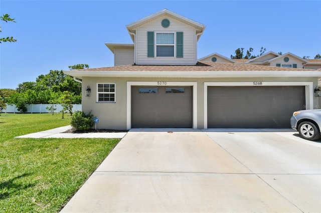 5270 Neil Dr, Saint Petersburg, FL 33714 - view of front of property featuring concrete driveway, roof with shingles, and an attached garage