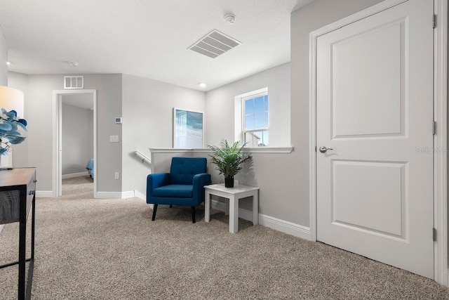 5270 Neil Dr, Saint Petersburg, FL 33714 - living area featuring carpet flooring and baseboards