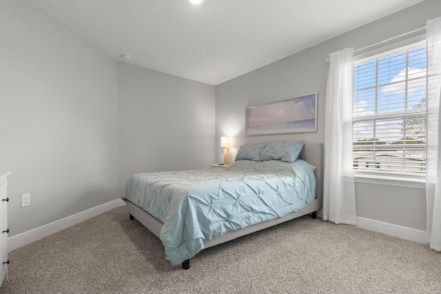 5270 Neil Dr, Saint Petersburg, FL 33714 - carpeted bedroom featuring baseboards