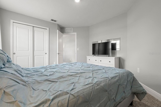5270 Neil Dr, Saint Petersburg, FL 33714 - carpeted bedroom featuring baseboards and a closet