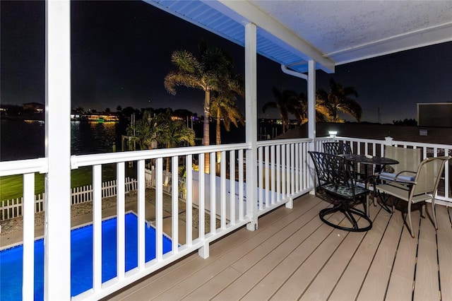 474 20th Ave, Indian Rocks Beach, FL 33785 - deck at twilight featuring a water view