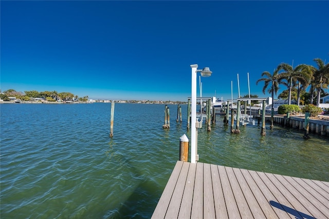 474 20th Ave, Indian Rocks Beach, FL 33785 - dock featuring boat lift and a water view