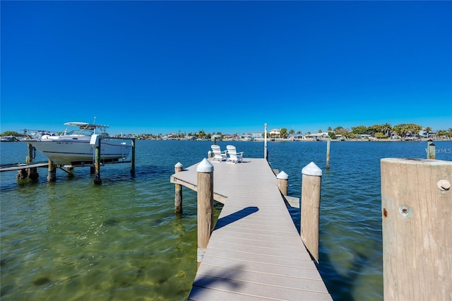 474 20th Ave, Indian Rocks Beach, FL 33785 - dock with a water view and boat lift