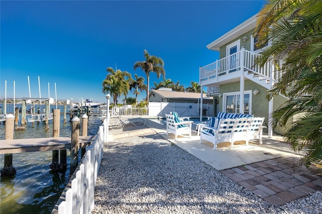 474 20th Ave, Indian Rocks Beach, FL 33785 - view of yard featuring a water view, a boat dock, a patio area, a balcony, and boat lift
