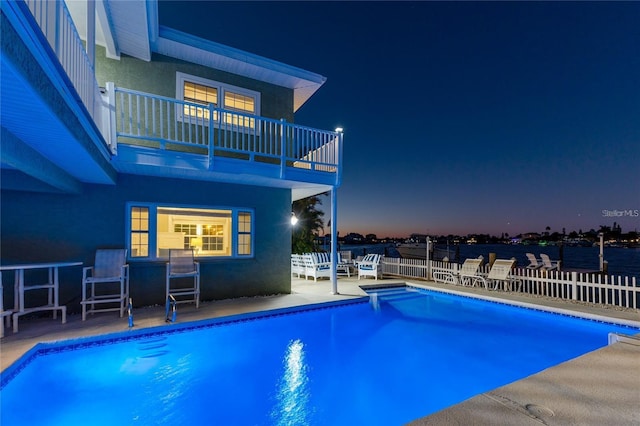 474 20th Ave, Indian Rocks Beach, FL 33785 - pool at twilight featuring a patio