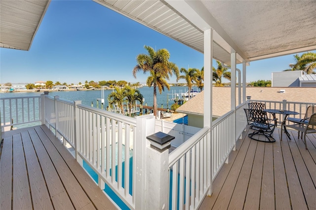 474 20th Ave, Indian Rocks Beach, FL 33785 - wooden deck with a water view