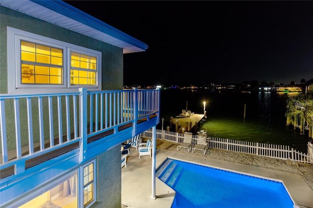 474 20th Ave, Indian Rocks Beach, FL 33785 - pool at twilight with a patio area