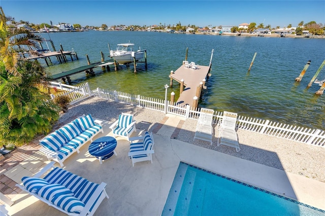 474 20th Ave, Indian Rocks Beach, FL 33785 - dock with a water view, boat lift, and a patio area