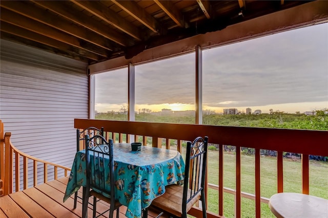 9484 Tara Cay Ct Unit 8, Seminole, FL 33776 - deck at dusk with outdoor dining area