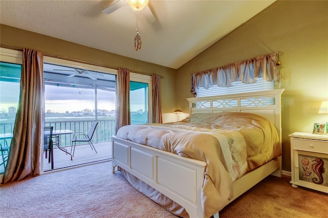 9484 Tara Cay Ct Unit 8, Seminole, FL 33776 - bedroom featuring carpet flooring, access to outside, vaulted ceiling, and ceiling fan