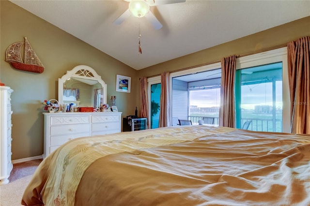 9484 Tara Cay Ct Unit 8, Seminole, FL 33776 - bedroom featuring access to exterior, lofted ceiling, light colored carpet, baseboards, and ceiling fan