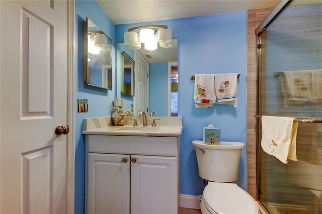 9484 Tara Cay Ct Unit 8, Seminole, FL 33776 - bathroom featuring a stall shower, toilet, and vanity