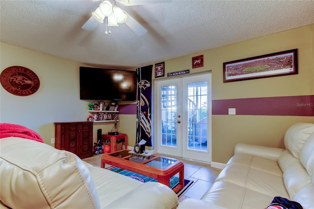 9484 Tara Cay Ct Unit 8, Seminole, FL 33776 - tiled living area featuring french doors, a textured ceiling, and a ceiling fan