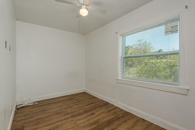 2911 16th Ave S Unit A, Saint Petersburg, FL 33712 - empty room featuring dark wood-style floors, baseboards, and a ceiling fan