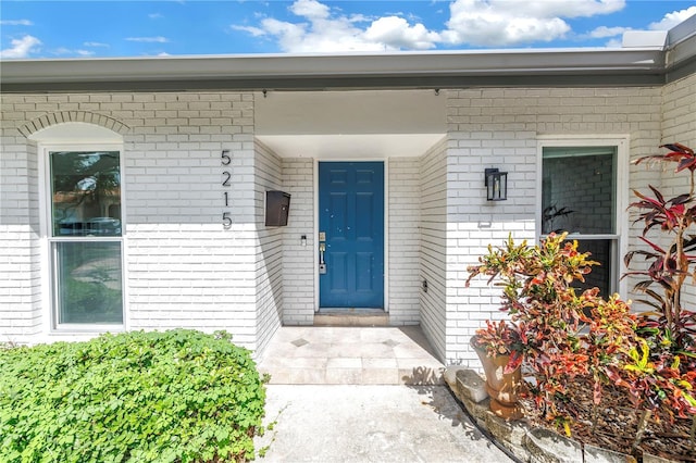 5215 Denver St NE, Saint Petersburg, FL 33703 - doorway to property with brick siding