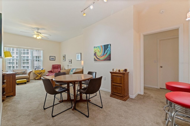 200 4th Ave S Unit 220, Saint Petersburg, FL 33701 - dining room with light colored carpet and ceiling fan