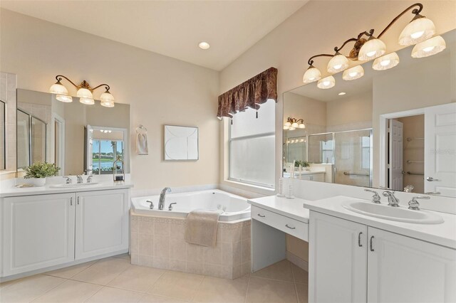 5009 Sandy Brook Cir, Wimauma, FL 33598 - bathroom featuring a shower stall, two vanities, tile patterned floors, and a bath