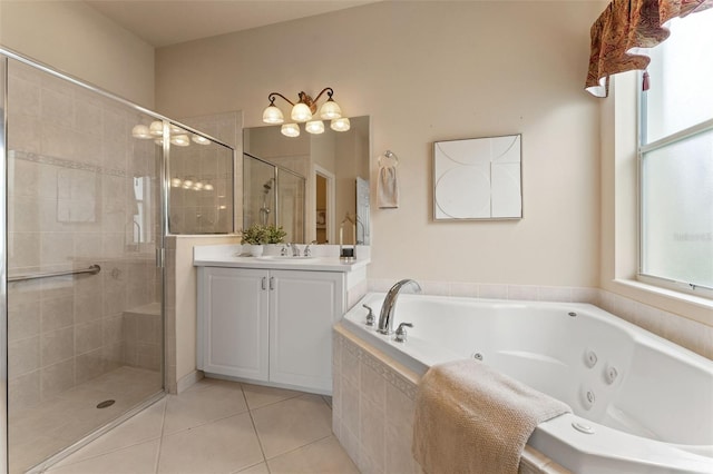 5009 Sandy Brook Cir, Wimauma, FL 33598 - bathroom featuring vanity, a stall shower, tile patterned flooring, and a whirlpool tub