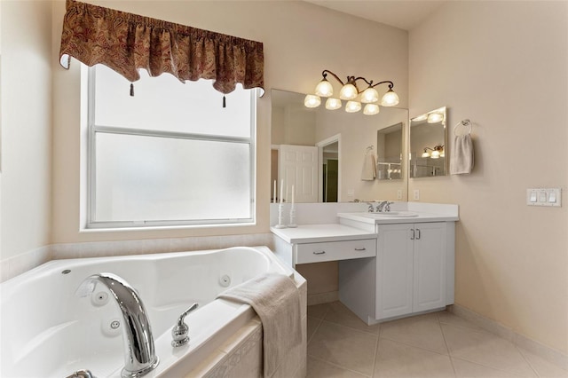 5009 Sandy Brook Cir, Wimauma, FL 33598 - bathroom featuring vanity, tile patterned flooring, and a jetted tub