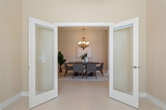 5009 Sandy Brook Cir, Wimauma, FL 33598 - dining area featuring french doors, a chandelier, and light tile patterned floors