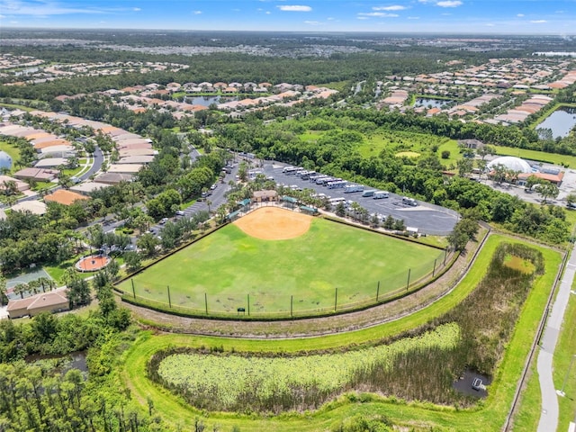 5009 Sandy Brook Cir, Wimauma, FL 33598 - aerial perspective of suburban area with a large body of water