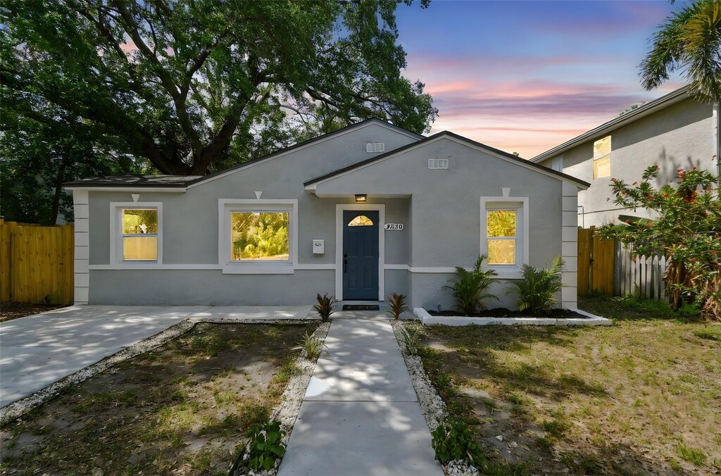 2230 Melrose Ave S, Saint Petersburg, FL 33712 - view of front of property featuring fence and stucco siding