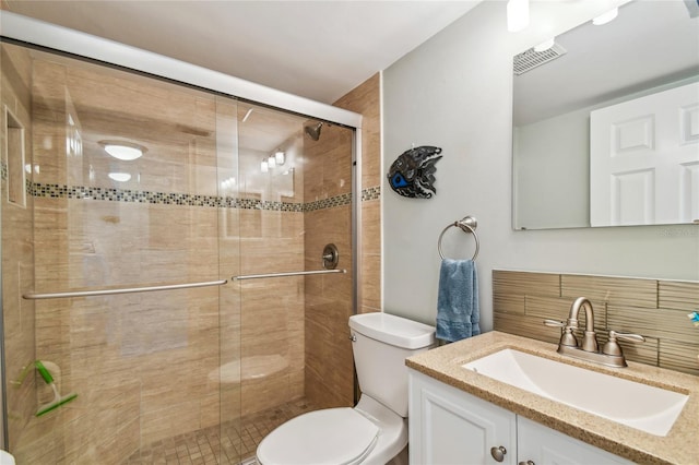 200 1st Ave Unit 309, St Pete Beach, FL 33706 - full bath featuring toilet, a stall shower, and vanity