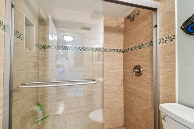 200 1st Ave Unit 309, St Pete Beach, FL 33706 - bathroom with toilet and a stall shower