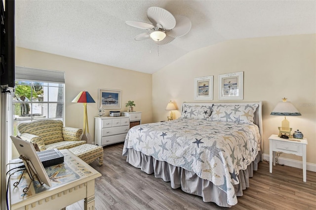 3520 51st Ave W, Bradenton, FL 34210 - bedroom with lofted ceiling, wood finished floors, a ceiling fan, and baseboards