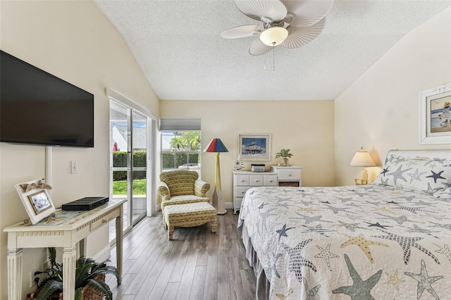 3520 51st Ave W, Bradenton, FL 34210 - bedroom featuring vaulted ceiling, a textured ceiling, access to exterior, and wood finished floors