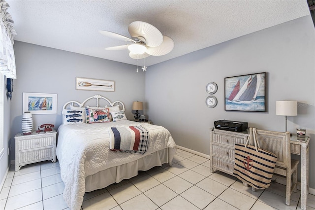 3520 51st Ave W, Bradenton, FL 34210 - bedroom featuring a textured ceiling, light tile patterned floors, ceiling fan, and baseboards