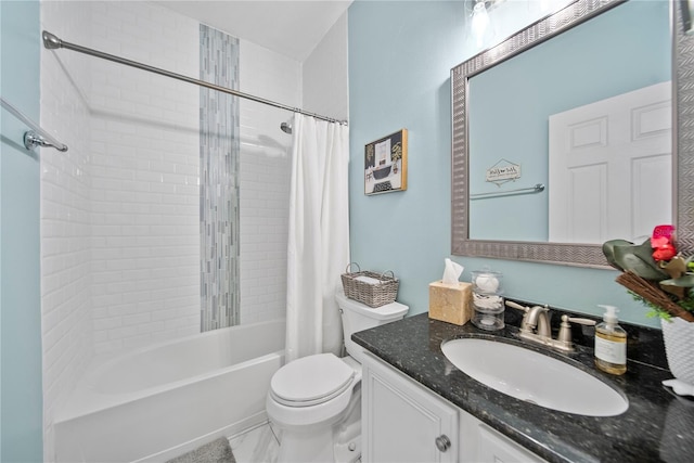 bathroom with toilet, shower / bath combo, and vanity