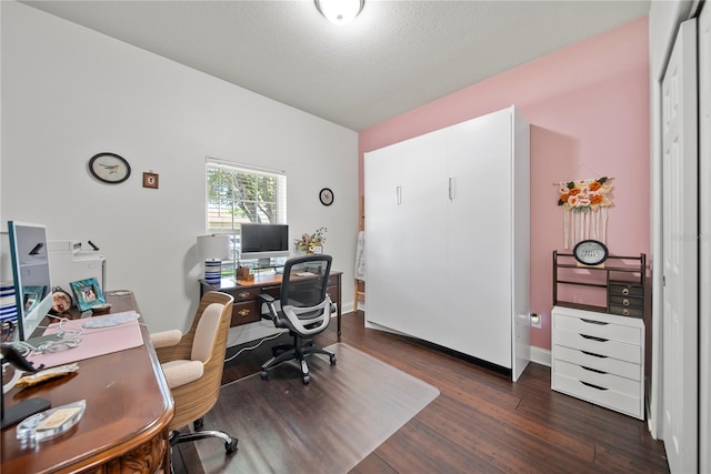 office space featuring dark wood-style floors and baseboards