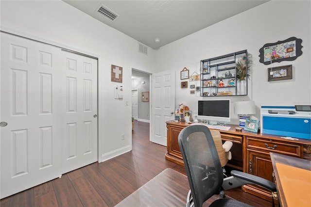 office area with wood finished floors and baseboards