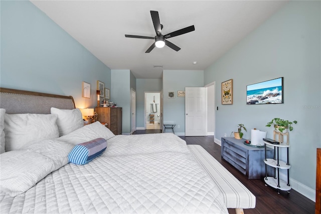 bedroom with wood finished floors, baseboards, and a ceiling fan
