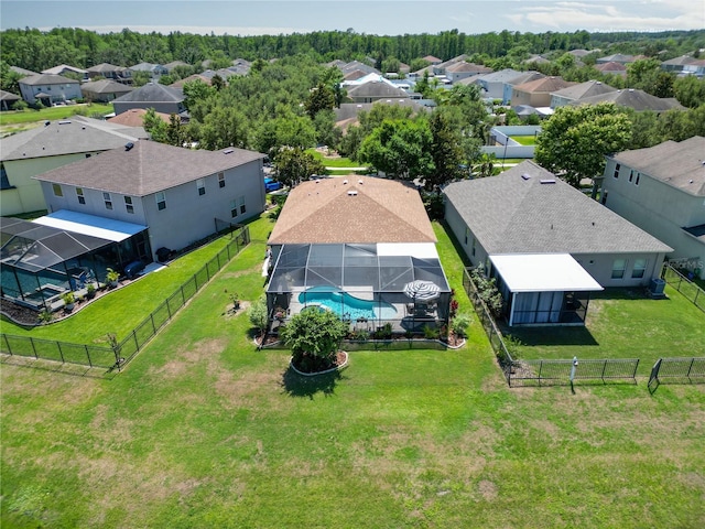aerial perspective of suburban area with a pool
