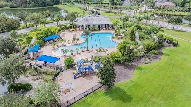 aerial view of a pool and a large body of water