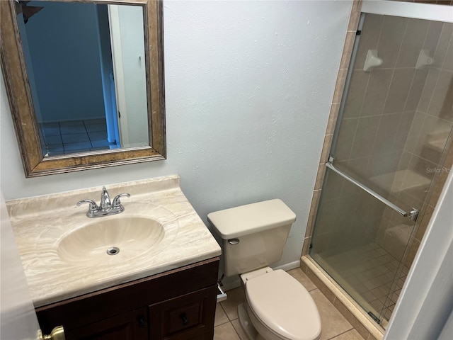 647 Fairmont Ave Unit C, Safety Harbor, FL 34695 - full bathroom with a shower stall, tile patterned floors, toilet, and vanity