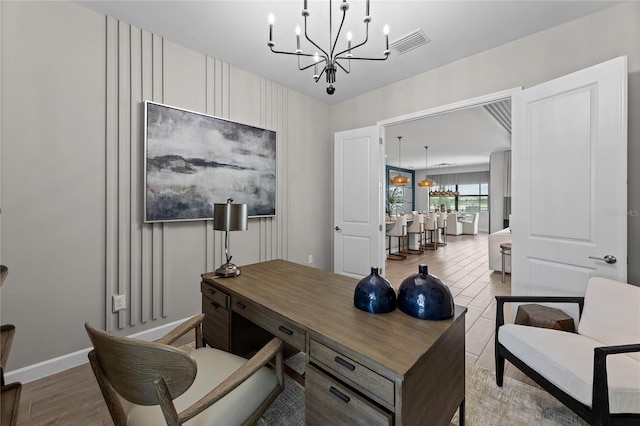 10447 New Brunswick St, Port Charlotte, FL 33981 - office area with a chandelier, baseboards, and wood finished floors