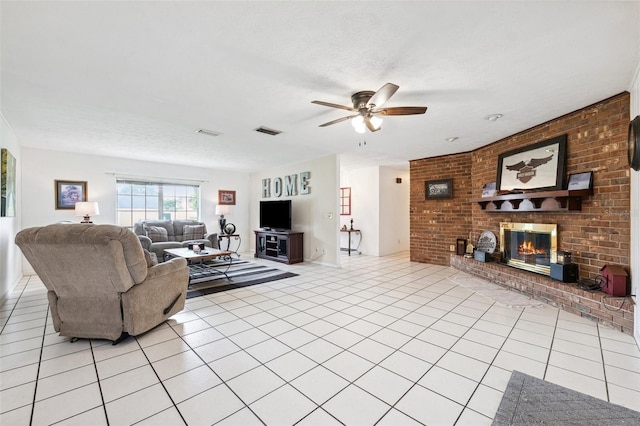 2013 Capri Rd, Valrico, FL 33594 - living room with ceiling fan, light tile patterned floors, a fireplace, a textured ceiling, and baseboards