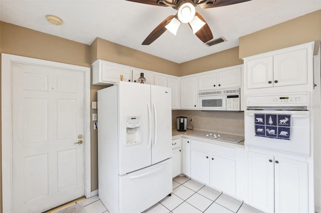 2013 Capri Rd, Valrico, FL 33594 - kitchen featuring white appliances, ceiling fan, white cabinets, light countertops, and light tile patterned floors